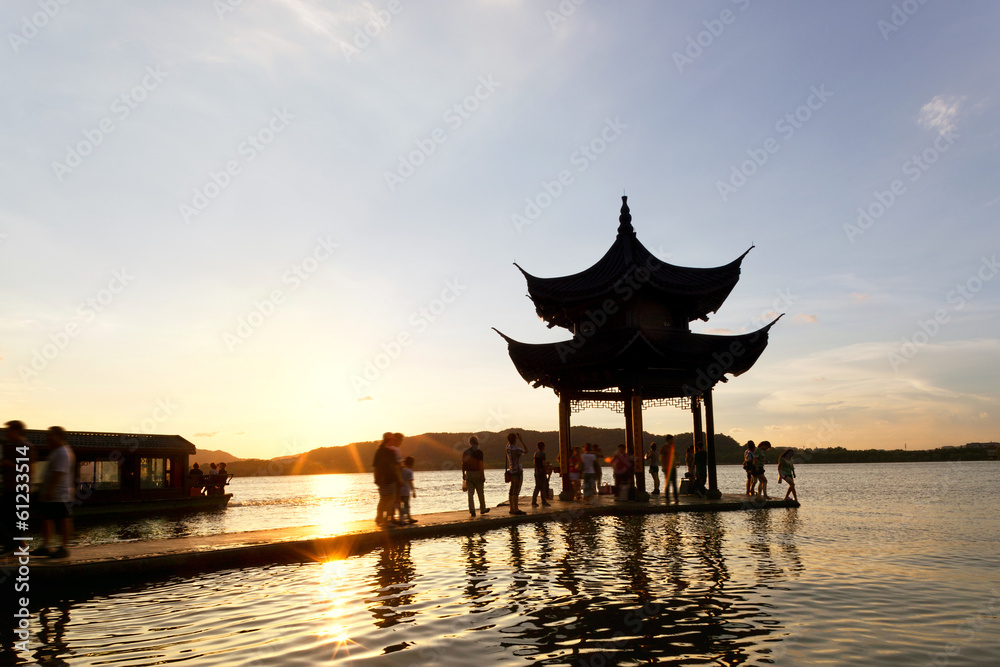 pavilion at nightfall in west lake ，hangzhou ，China