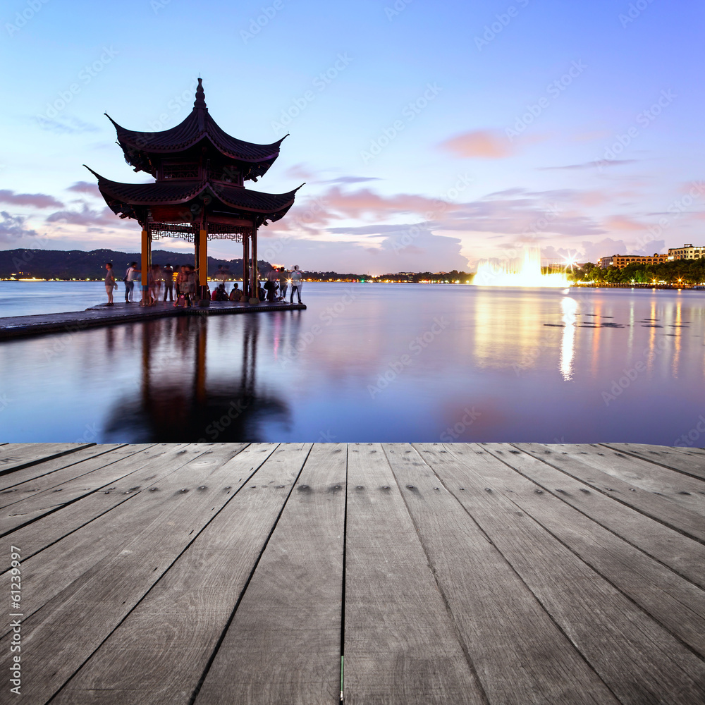 pavilion at nightfall in west lake ，hangzhou ，China