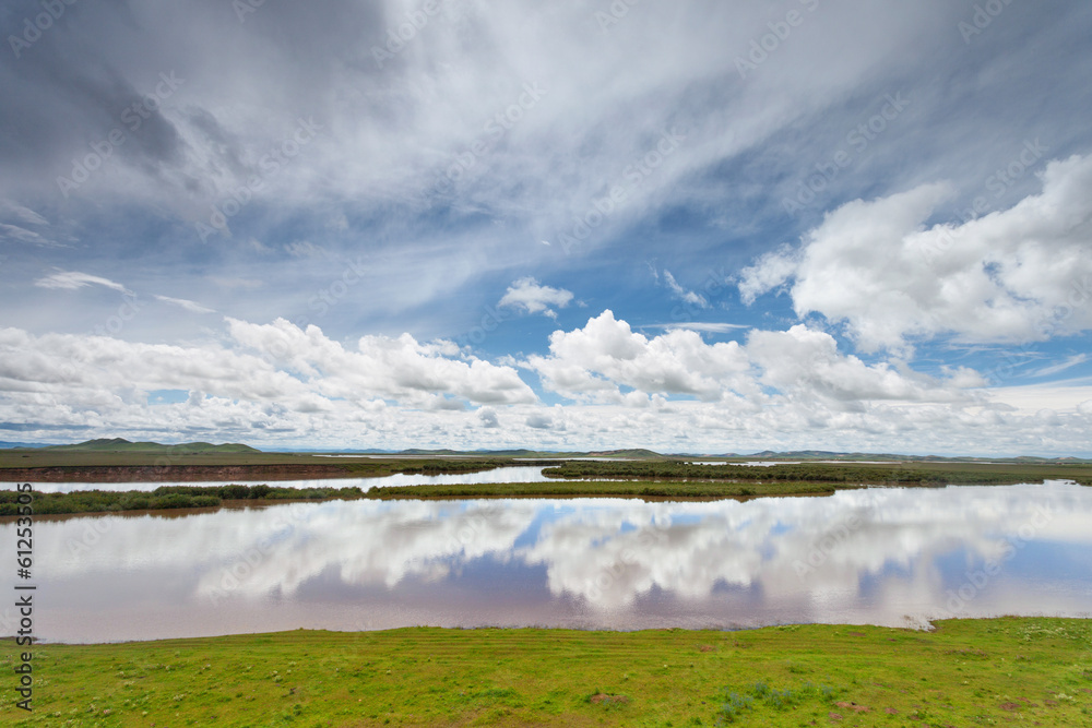 summer landscape with river and blue sky