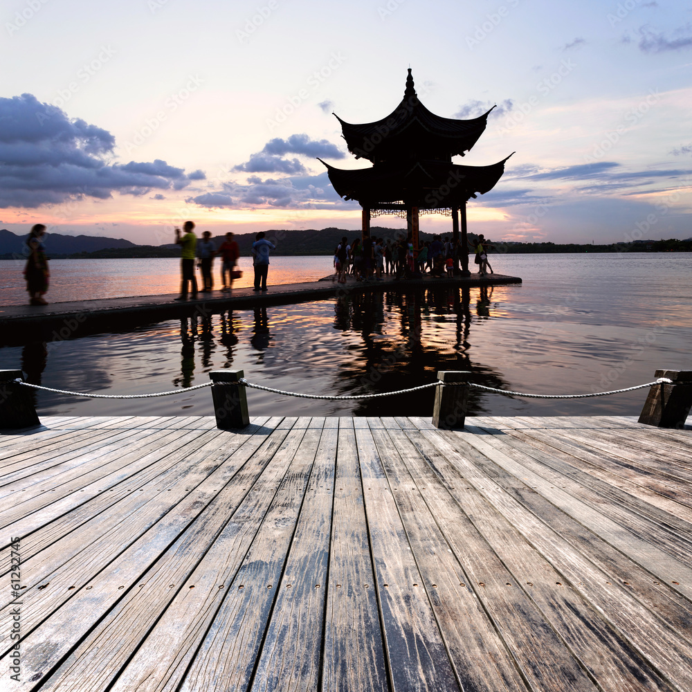 pavilion at nightfall in west lake ，hangzhou ，China