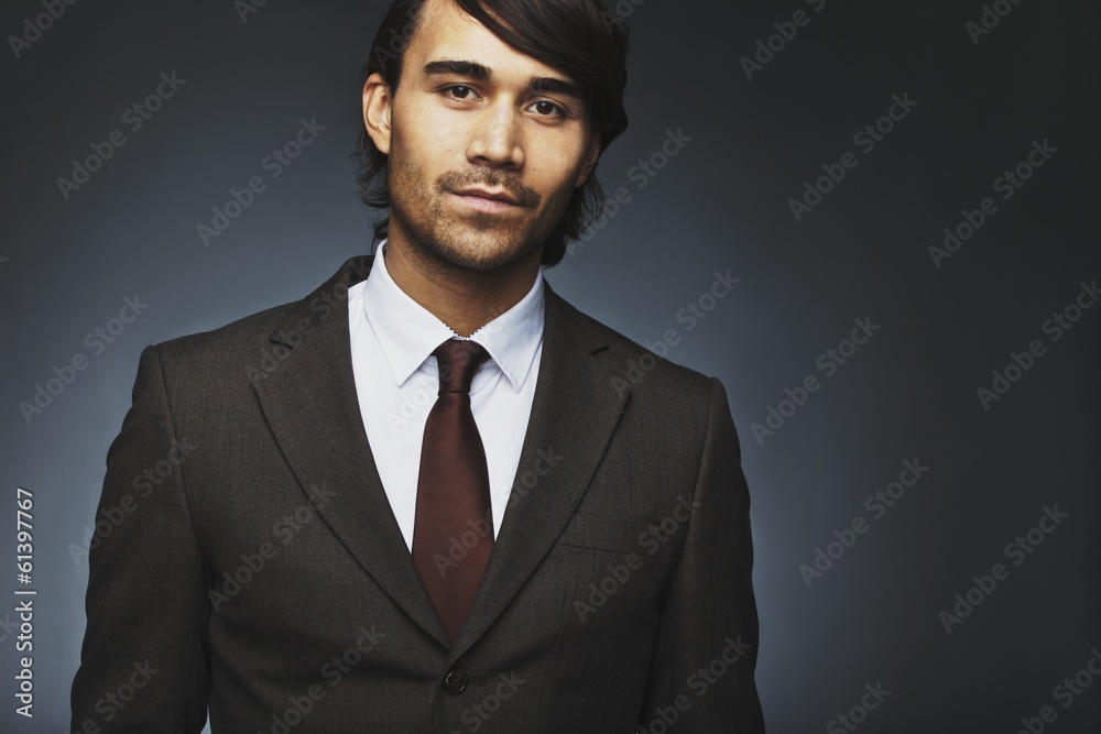 Handsome young businessman in suit