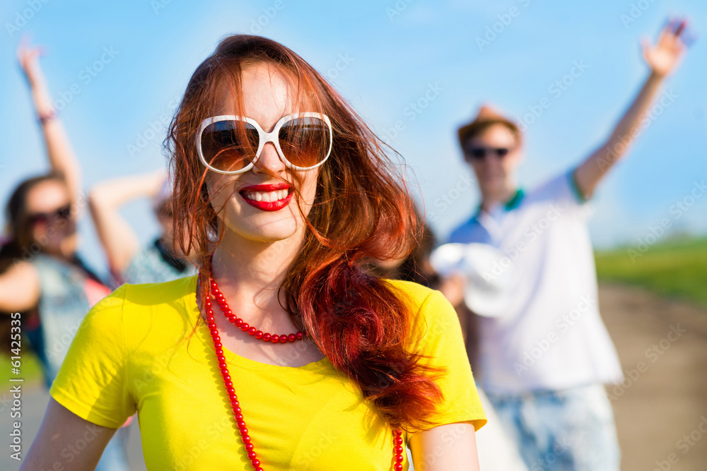 stylish young woman in sunglasses