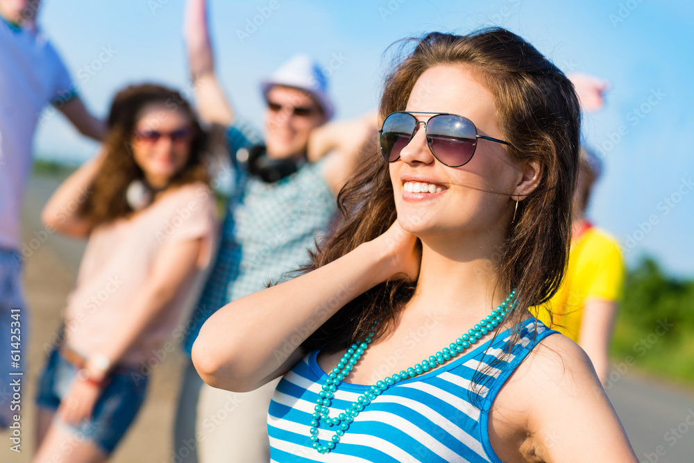 stylish young woman in sunglasses