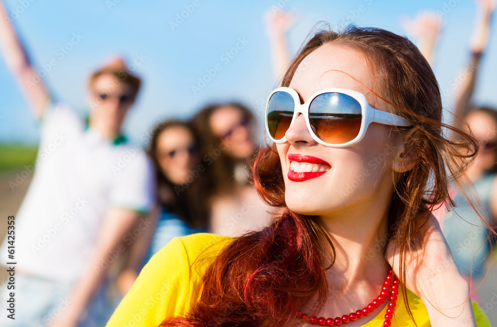 stylish young woman in sunglasses