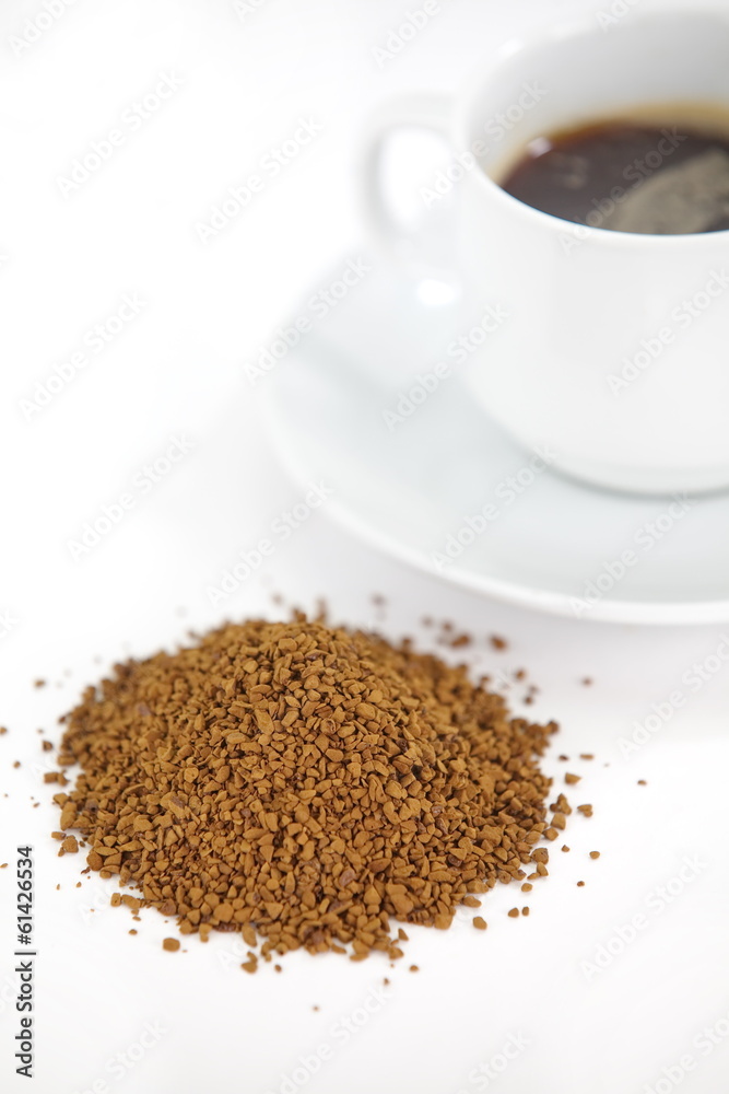 Cup with instant coffee isolated on white background