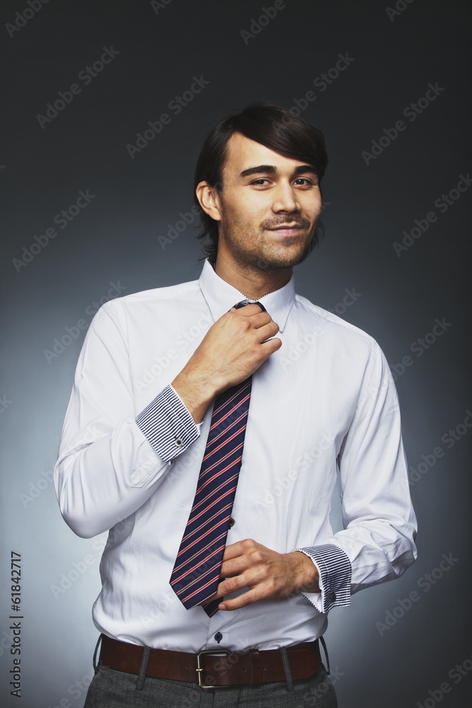 Male model getting ready for work