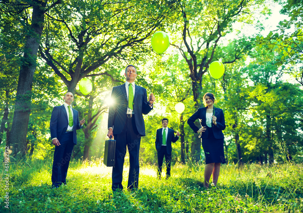 Group of Business People Holding Balloons