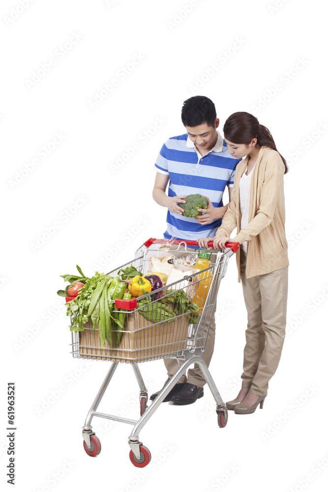 .Young Couple Grocery Shopping.