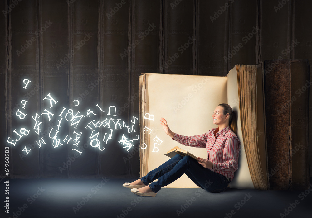 young woman reading a book