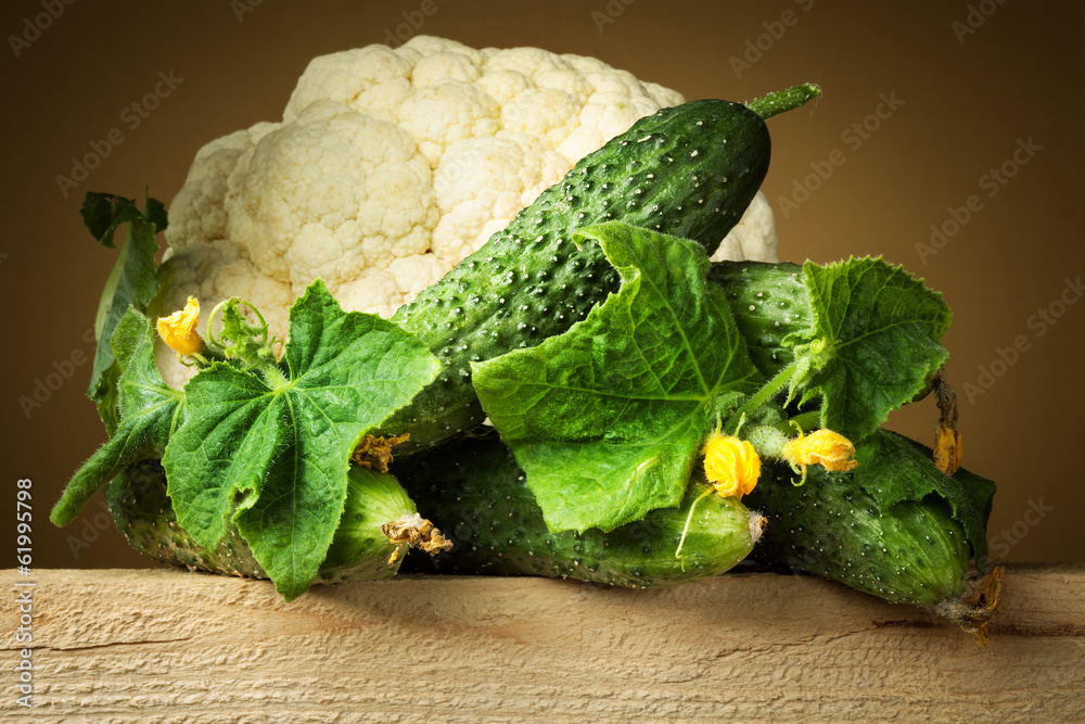 Organic cucumber and cauliflower with leaves