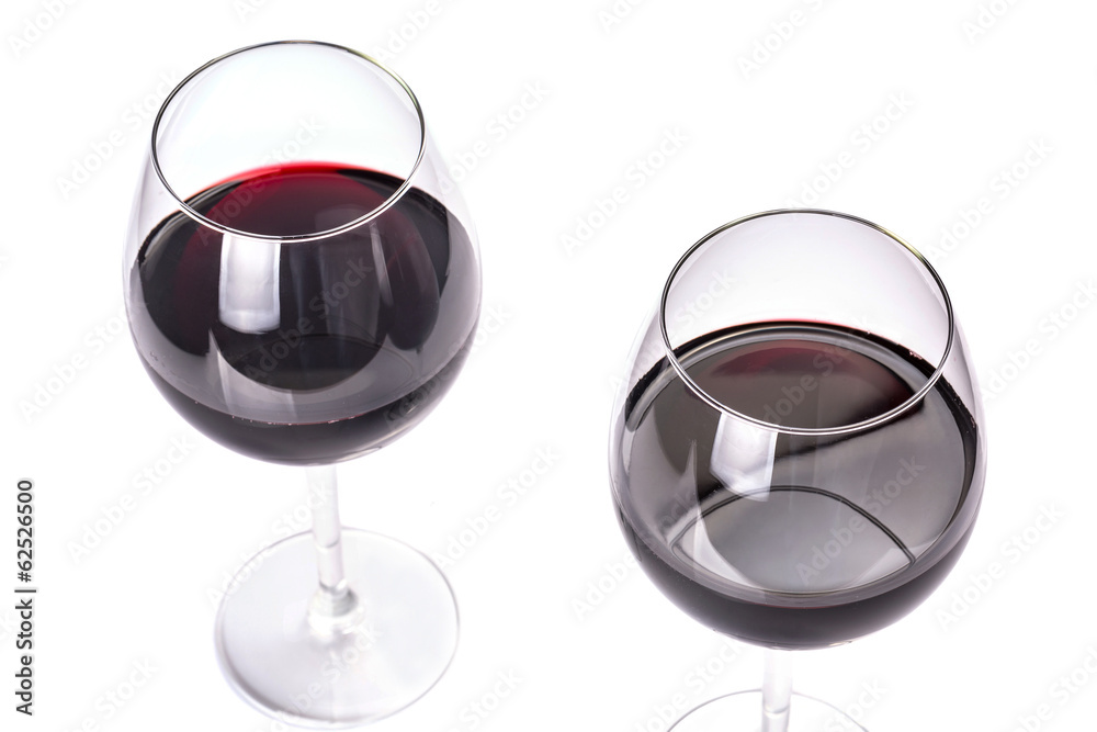 Glasses of red wine isolated on white background