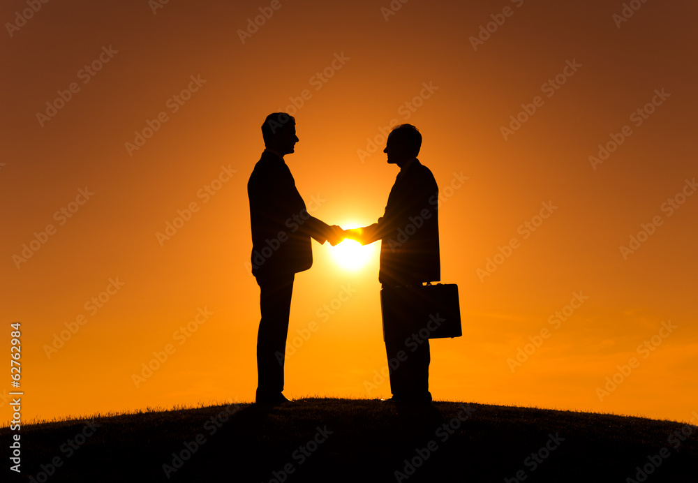 Business Agreement at Sunset