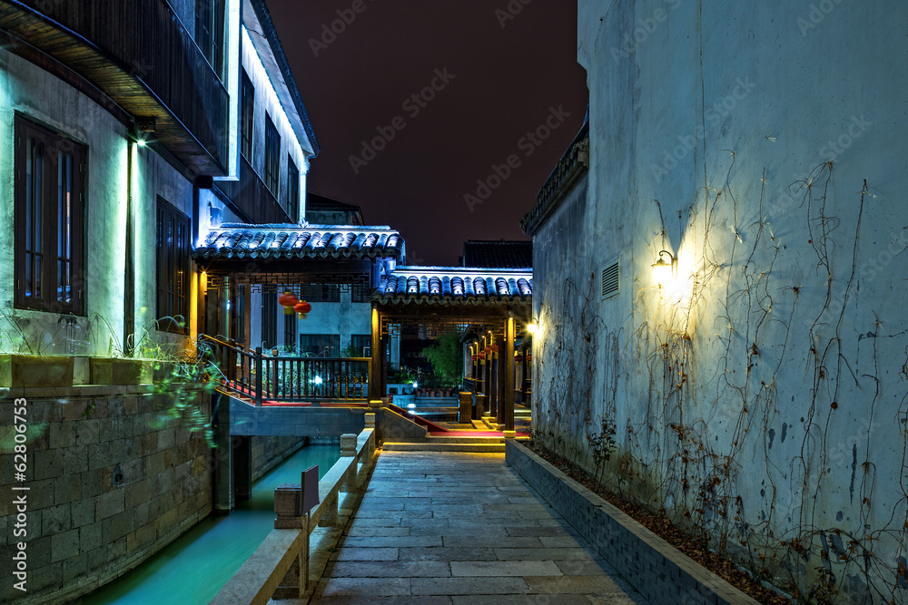 Night scene of traditional building near the river