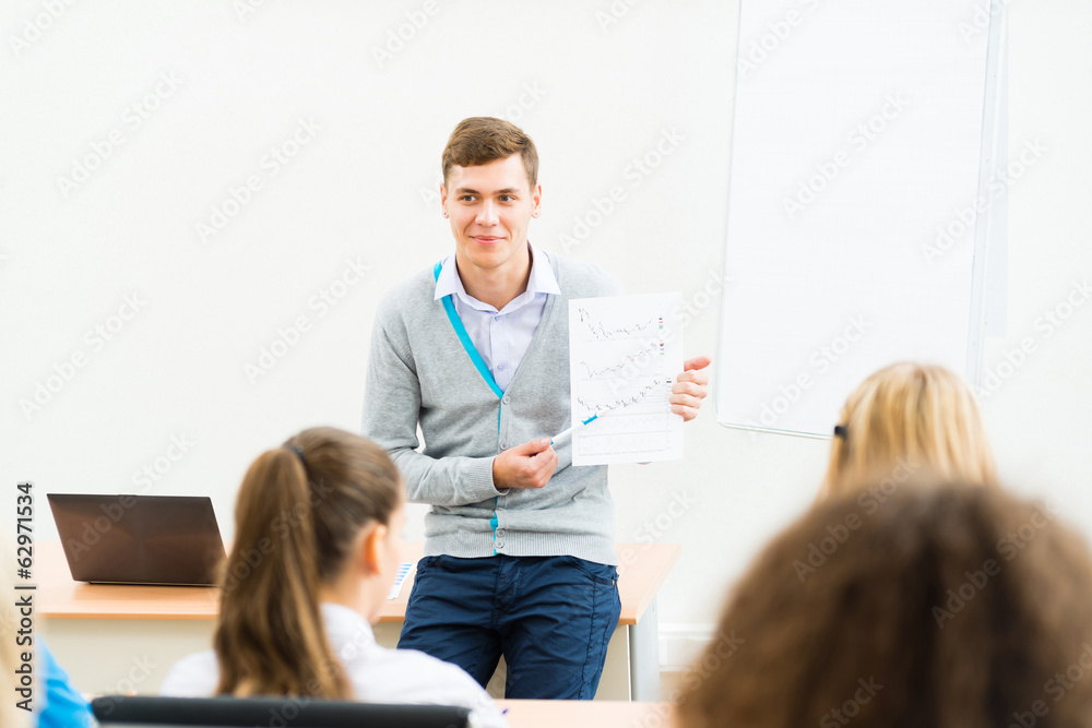 teacher talking with students