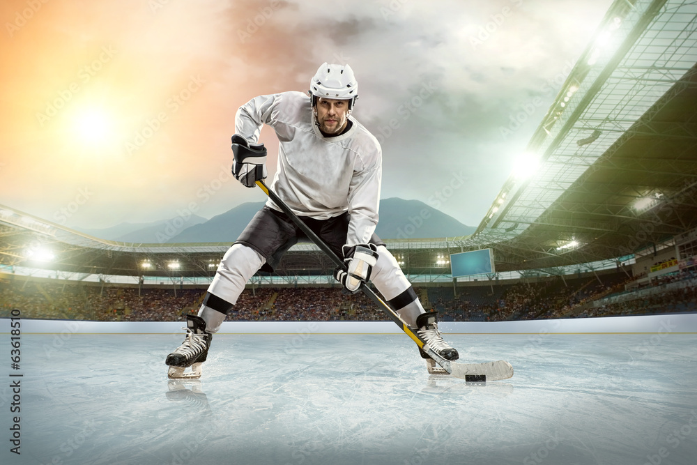 Ice hockey player on the ice. Open stadium - Winter Classic game