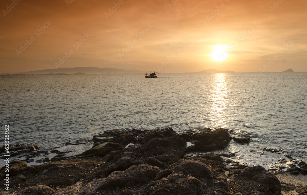 Sunrise over the sea and fishing boat in countryside,Hua Hin-Thailand