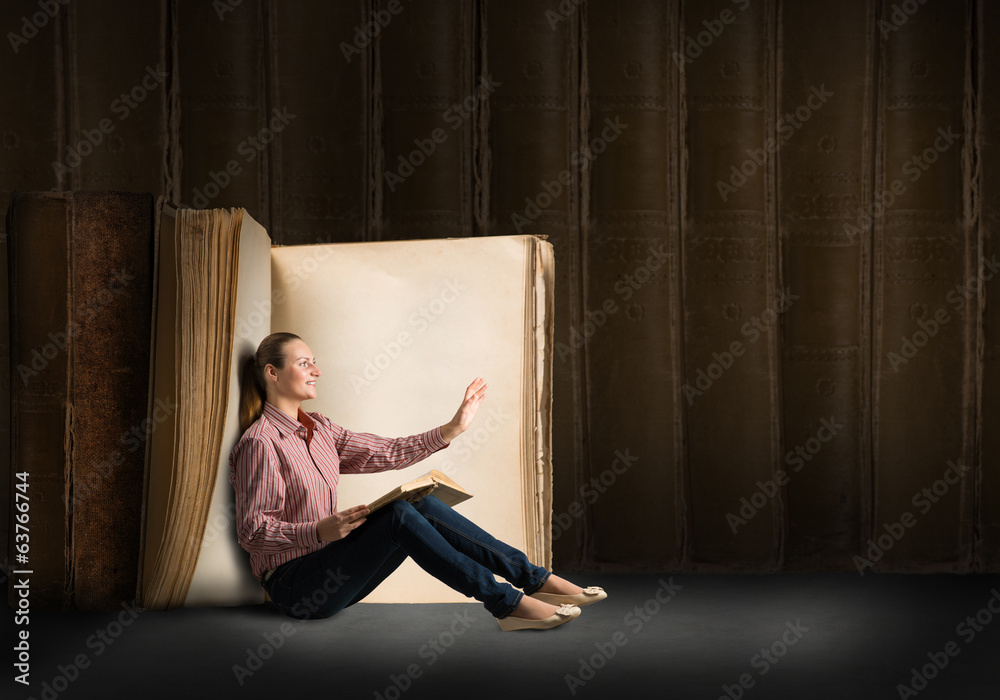 young woman reading a book