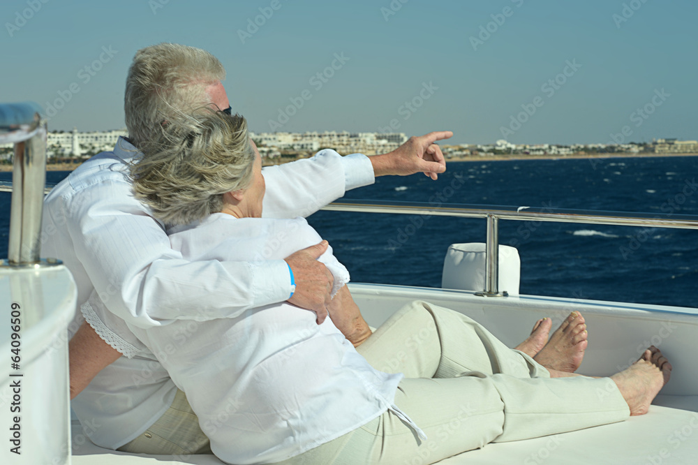 Couple have a ride in a boat on sea