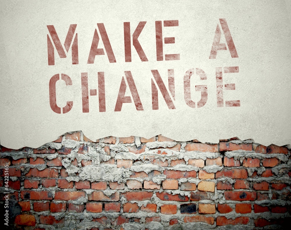 Make a change concept on old brick wall