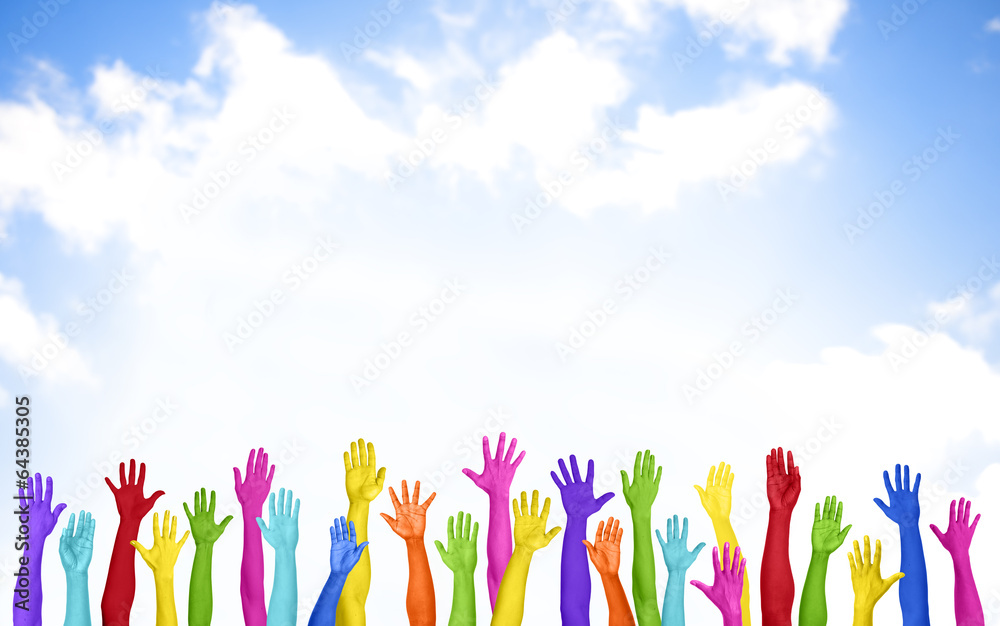 Colorful Hands Raised with Blue Sky