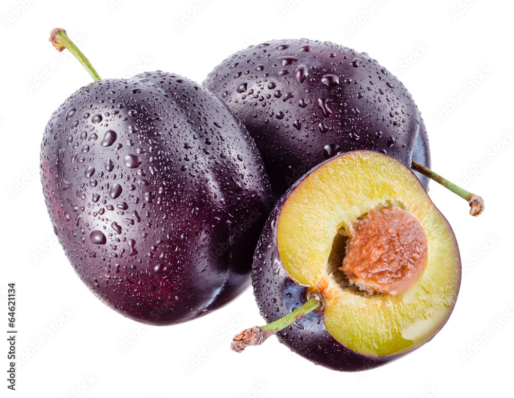 Plums. Wet fruits isolated on white