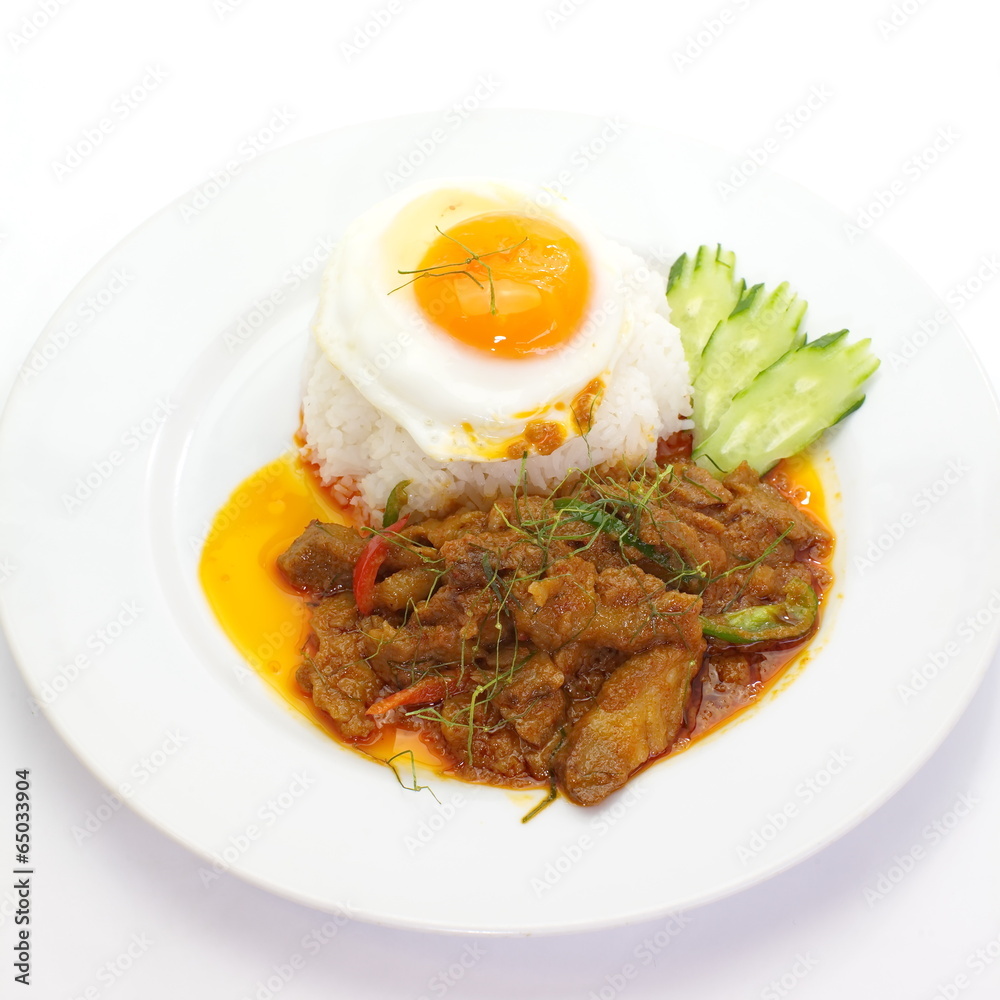 savory curry chicken with rice and fried egg