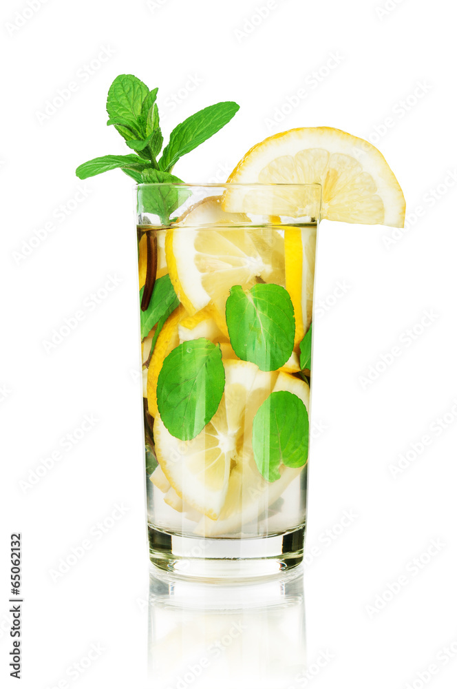 Iced tea with lemon and mint on white background