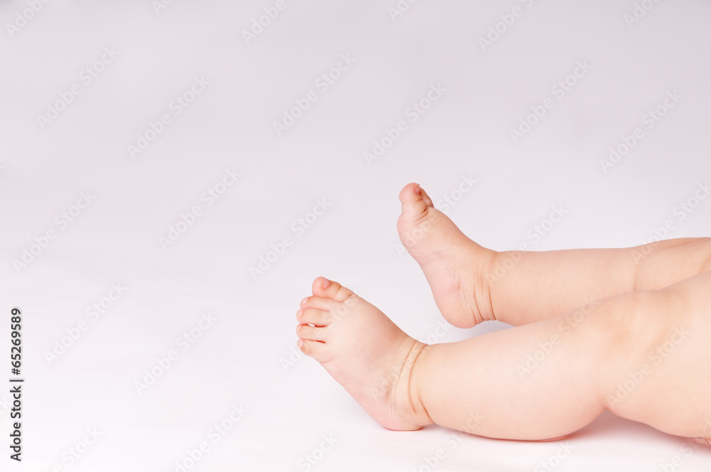 Close up of baby charming small legs