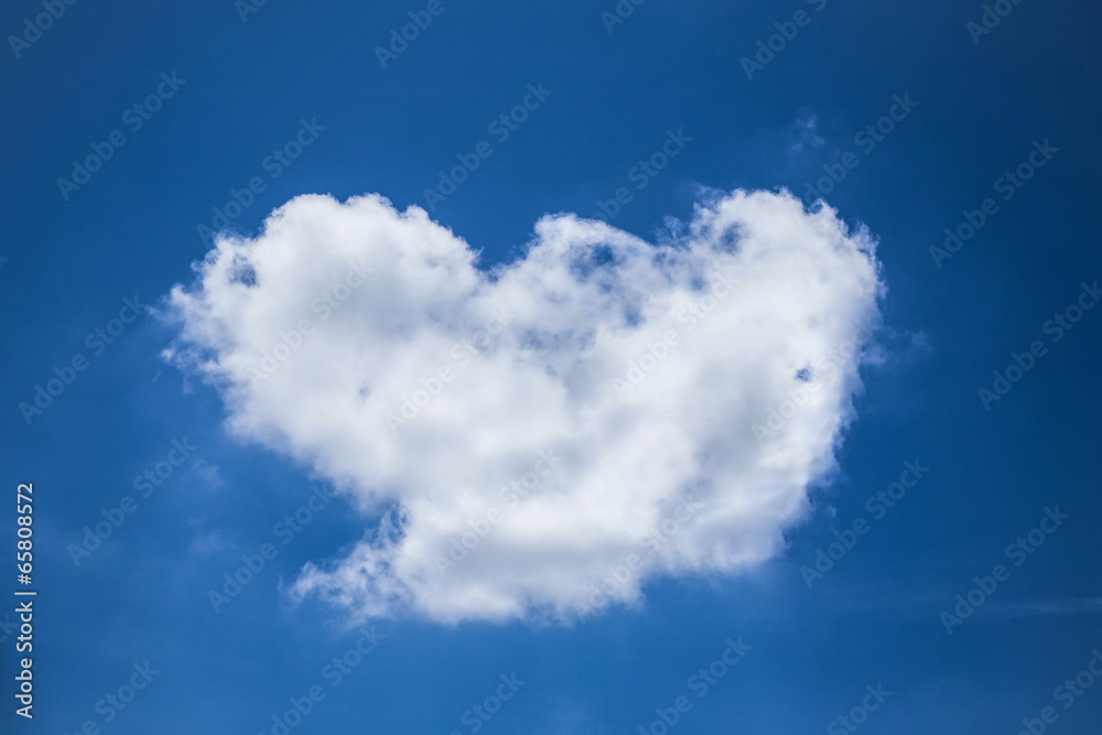 cloud  heart shaped on deep blue sky background