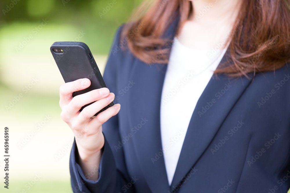 asian businesswoman using smart phone