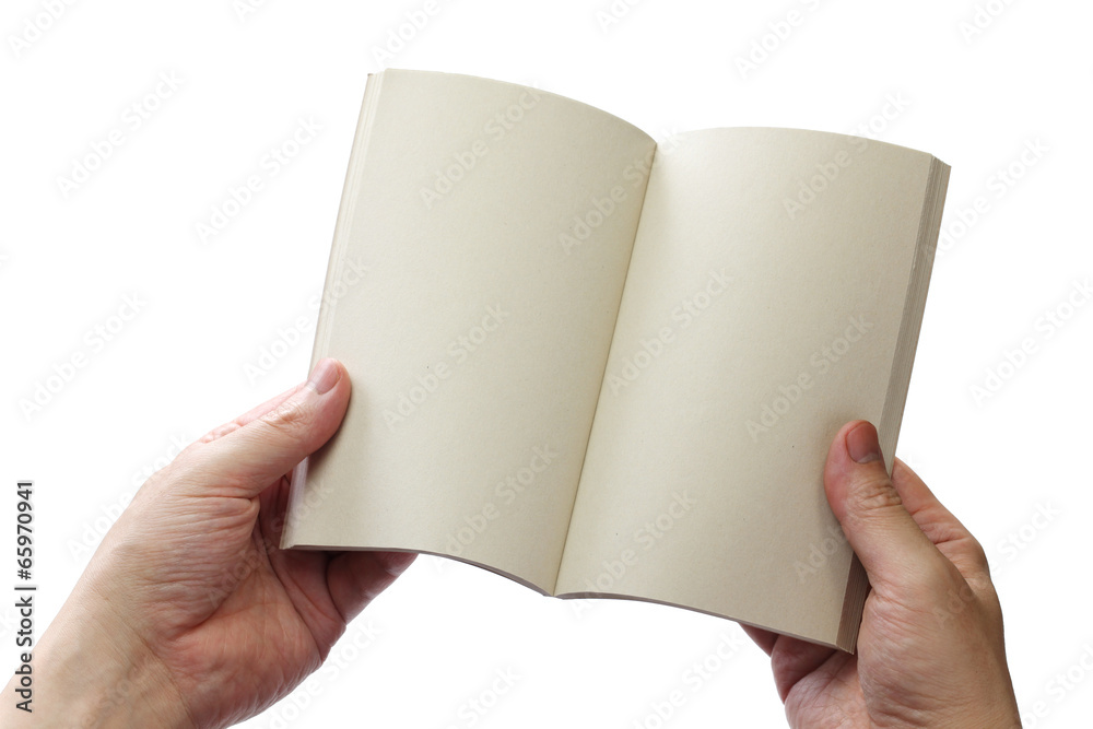 reading paperback, blank pages opens