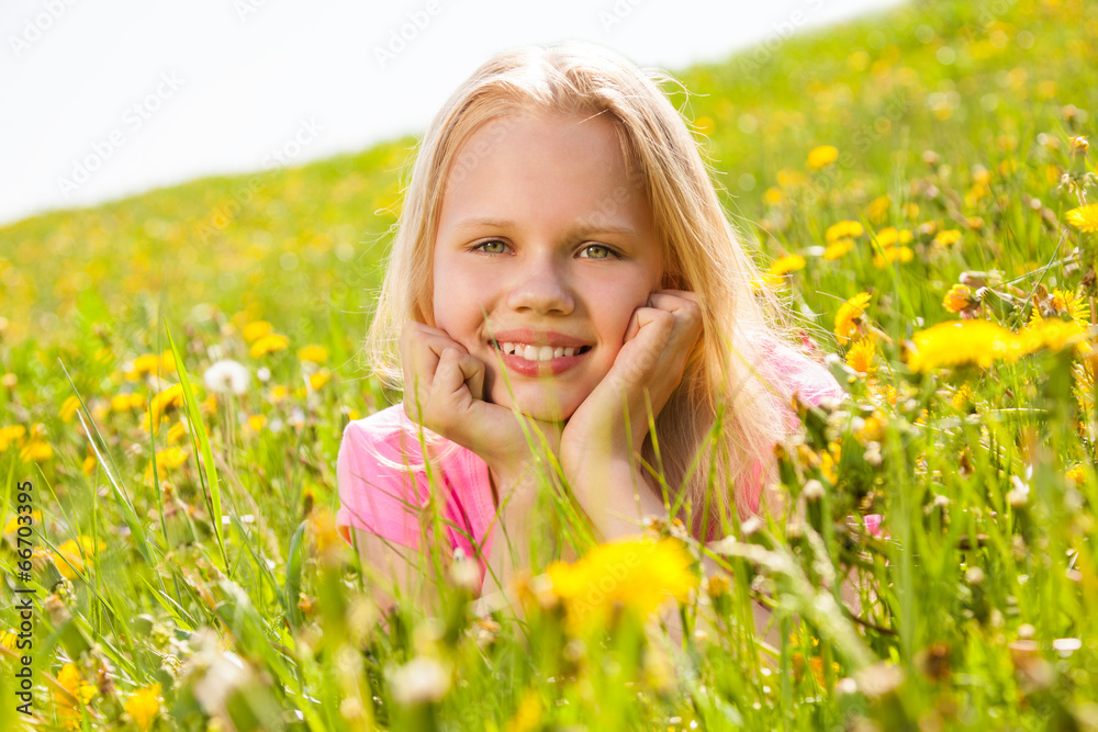 Smiling cute girl holding face with two hands