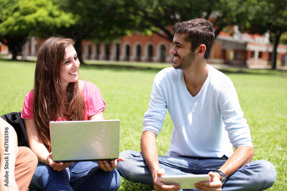 Happy College students using computer