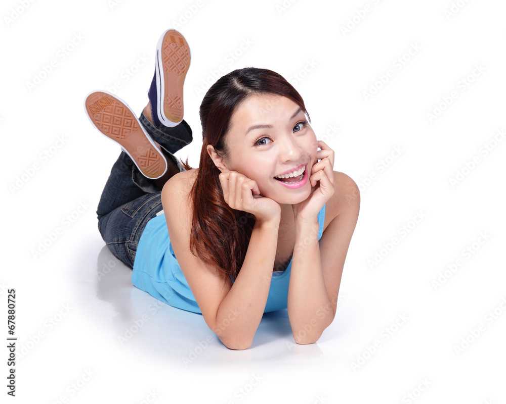 Happy young female student woman lying