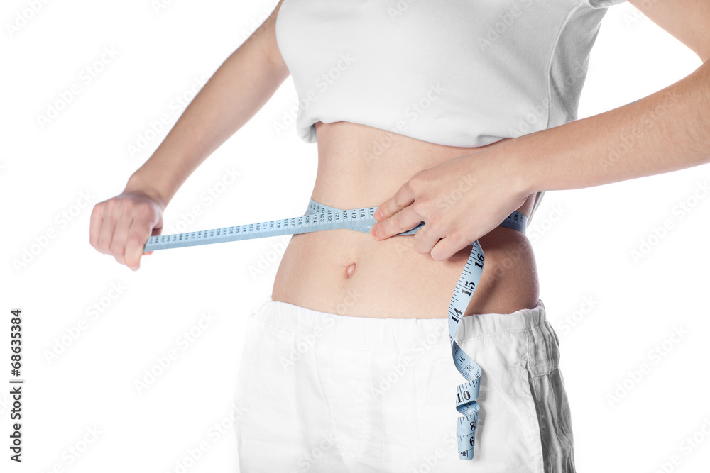 Woman measuring his waistline