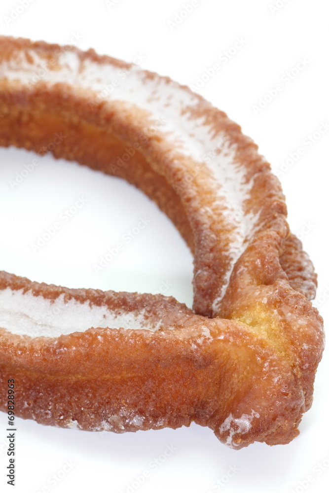 doughnuts with icing sugar on a white background