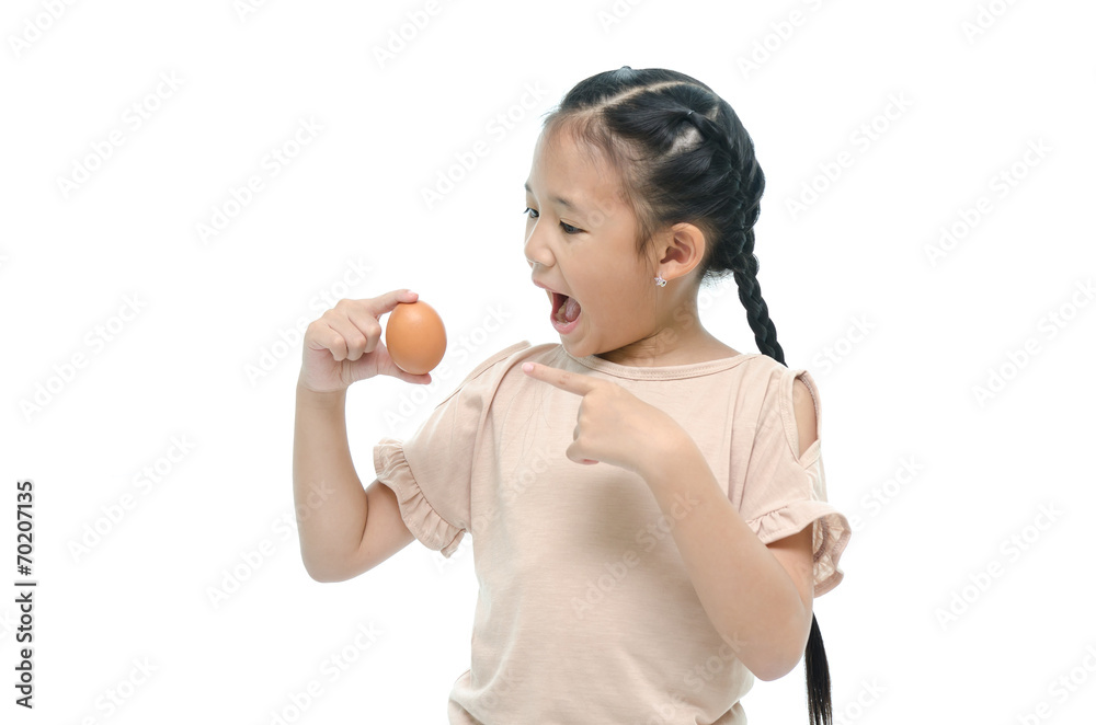 Asian girl smiiing and holding egg