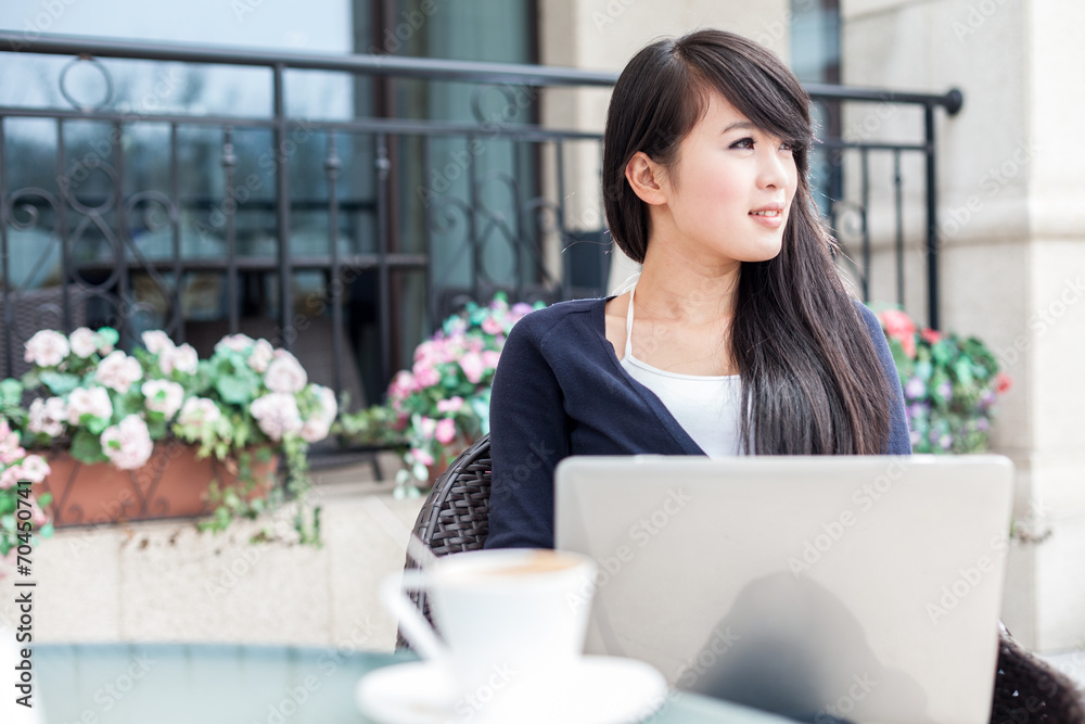 Young woman using computer