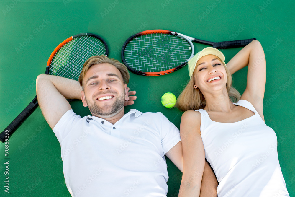 Young couple playing tennis