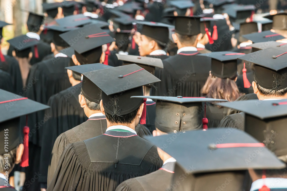 back of graduates during commencement.