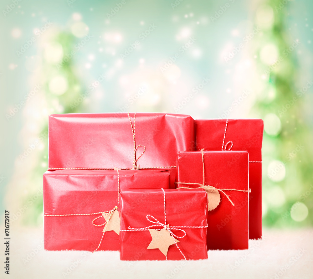 Gift boxes on christmas trees background