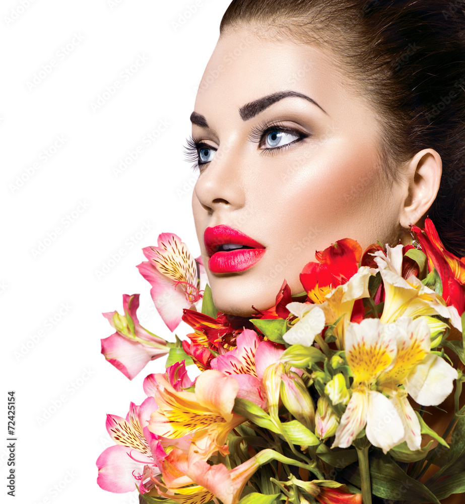 High fashion model girl with colorful flowers and red lips