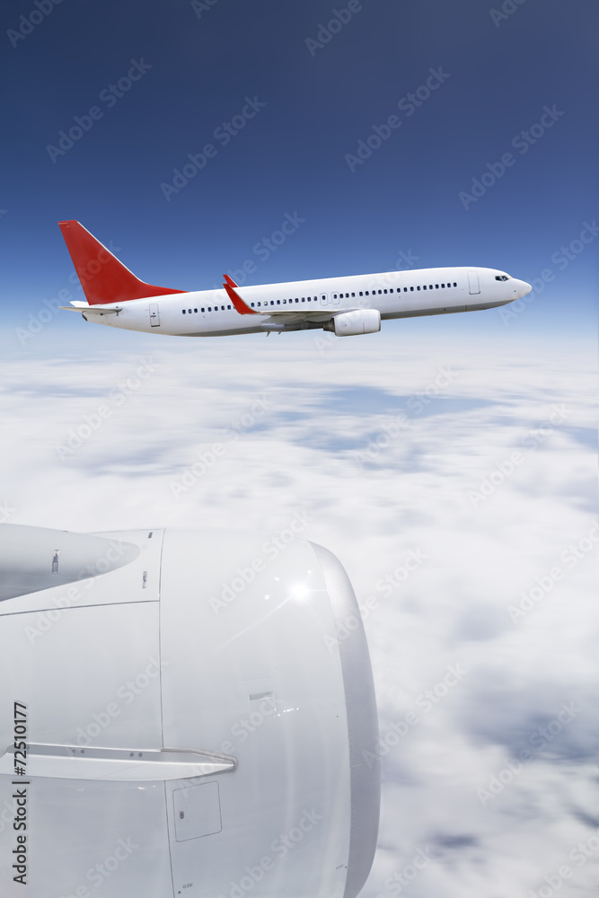 Plane flying over the clouds