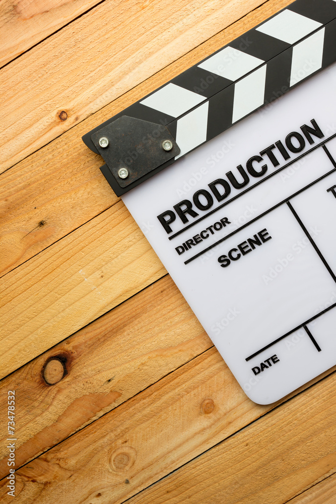 Movie slate film on wooden table