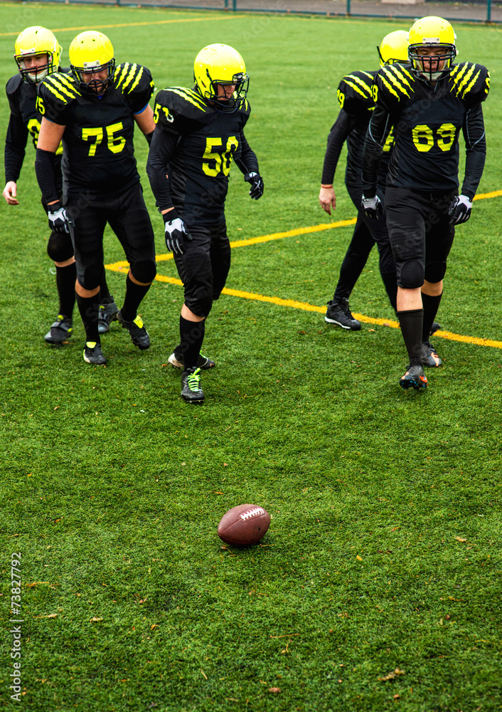 Men playing american football