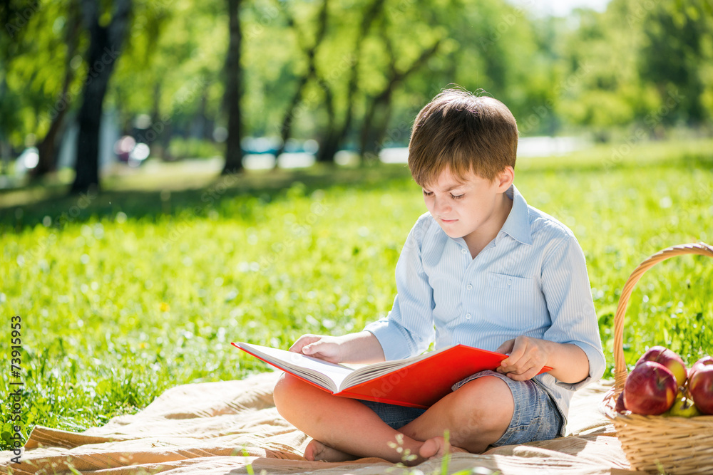 Boy in summer park