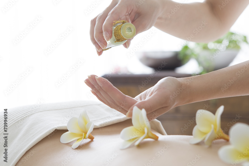 Woman who put a frangipani in back