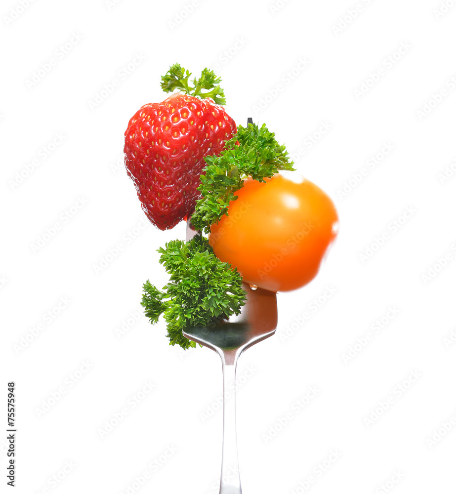 Mixed salad on fork isolated on white