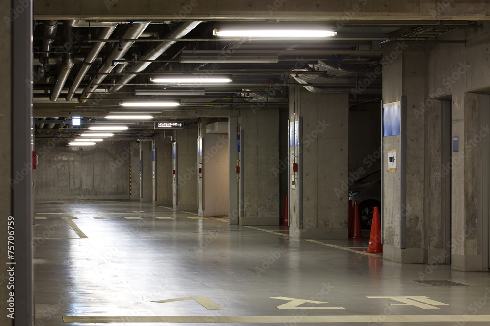 Parking garage underground interior, neon lights in dark