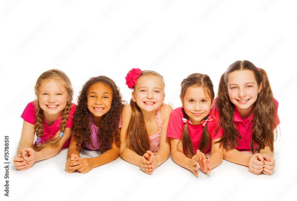 Isolated small girls laying on white background